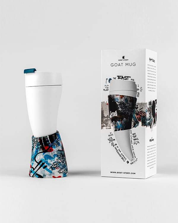 Coffee mug standing in holder by GOAT STORY